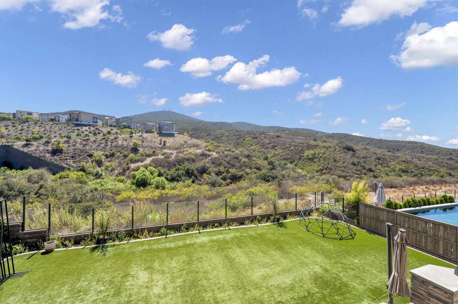 Rear yard, looking east into open space